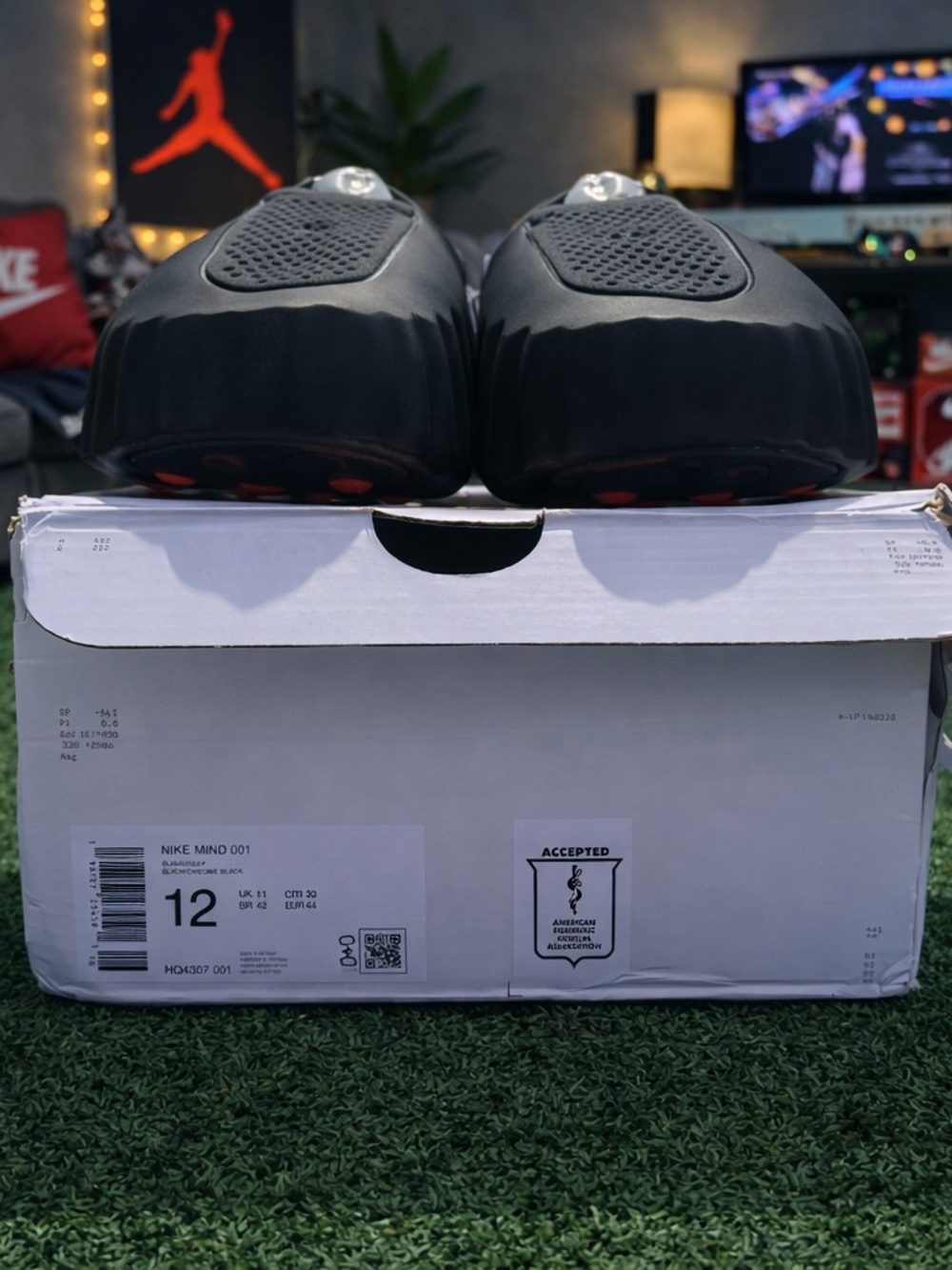 Nike Black Slide with White Swoosh and Red Accents - Picture 2 of 3